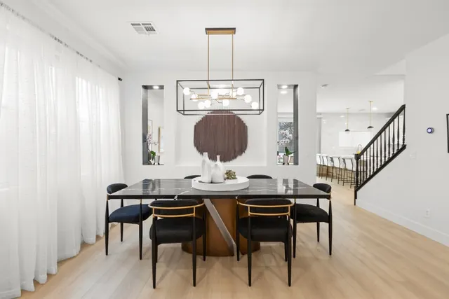 Dining area with statement chandelier