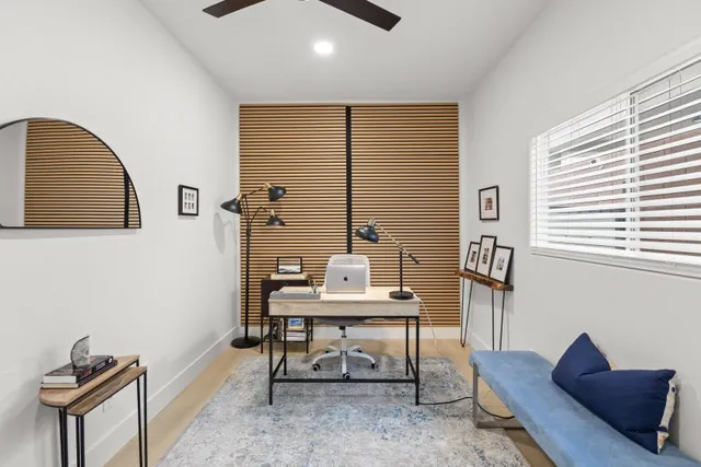 Home office with oak slat wall