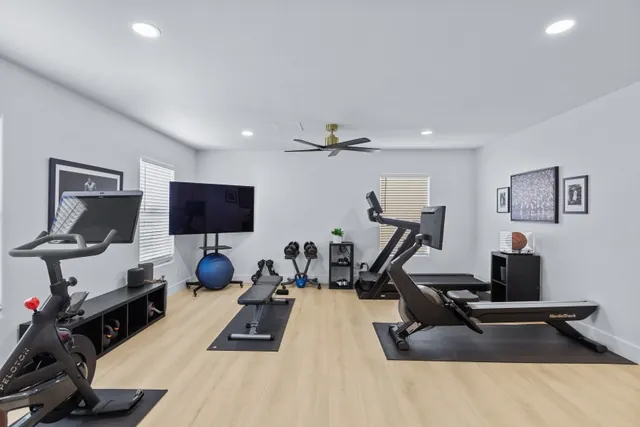 Home gym with Peloton and NordicTrack