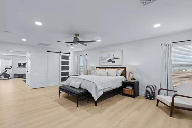 Secondary bedroom with barn door